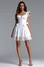 Load image into Gallery viewer, Henrietta Resort Flowy Short Sleeve Bow Ruched Woven Mini Dress	